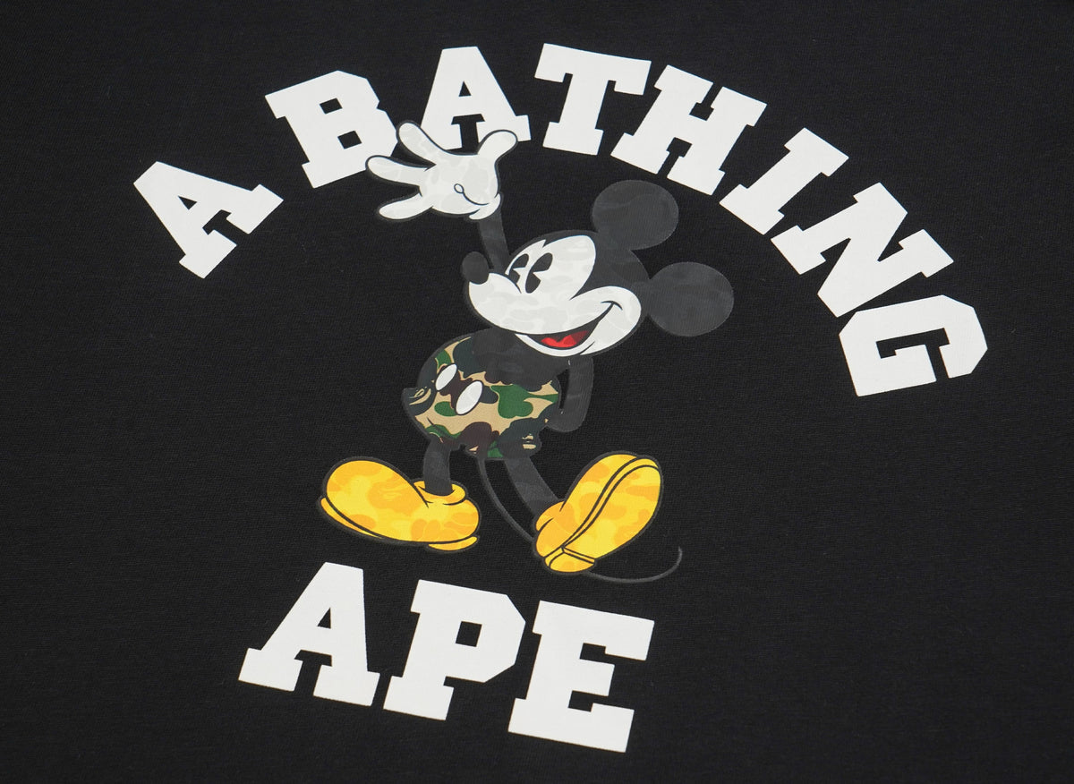 A BATHING APE アベイシングエイプ 【本物保証】 Tシャツ ストリート系 ユニセックス アベイシングエイプ x ディズニー ミッキーマウス カレッジ リラックスフィット Tシャツ "ブラック"