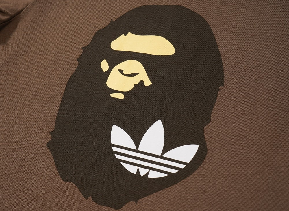 A BATHING APE アベイシングエイプ 【本物保証】 Tシャツ ストリート系 ユニセックス アベイシングエイプ x アディダス エイプヘッド Tシャツ "ブラウン"