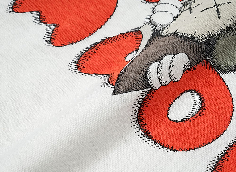 HUMAN MADE ヒューマンメイド 【本物保証】 Tシャツ ストリート系 ユニセックス ヒューマンメイド x カウズ カウズ メイド グラフィック Tシャツ #1 "ブラック" XX27TE014