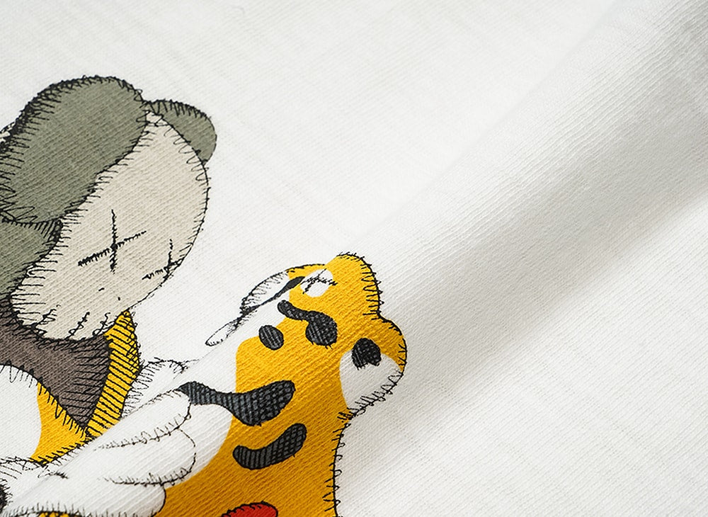 HUMAN MADE ヒューマンメイド 【本物保証】 Tシャツ ストリート系 ユニセックス ヒューマンメイド x カウズ カウズ メイド グラフィック Tシャツ #2 "ブラック" XX27TE015