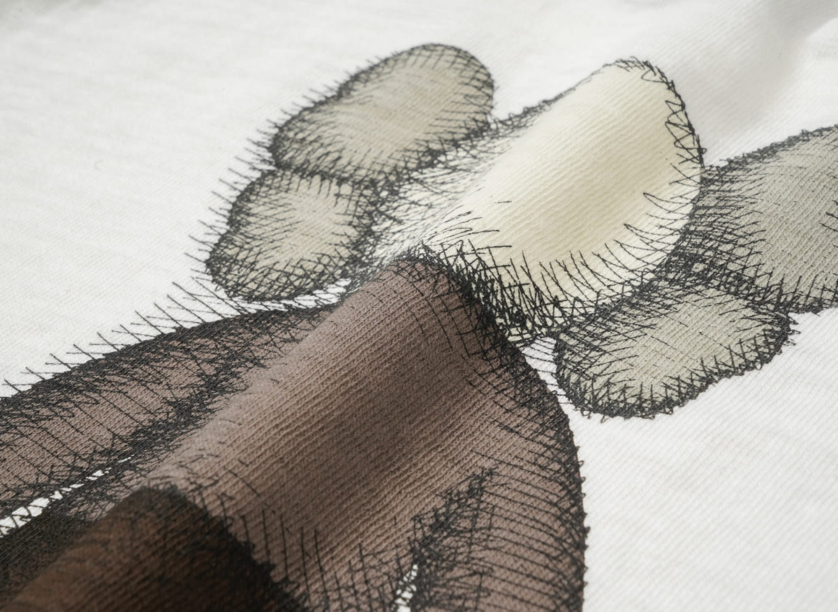 HUMAN MADE ヒューマンメイド 【本物保証】 Tシャツ ストリート系 ユニセックス ヒューマンメイド x カウズ カウズ メイド グラフィック Tシャツ #3 "ブラック" XX27TE016